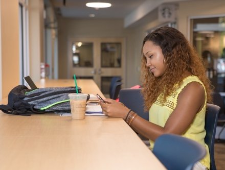 Student in Hudson Hall Lounge