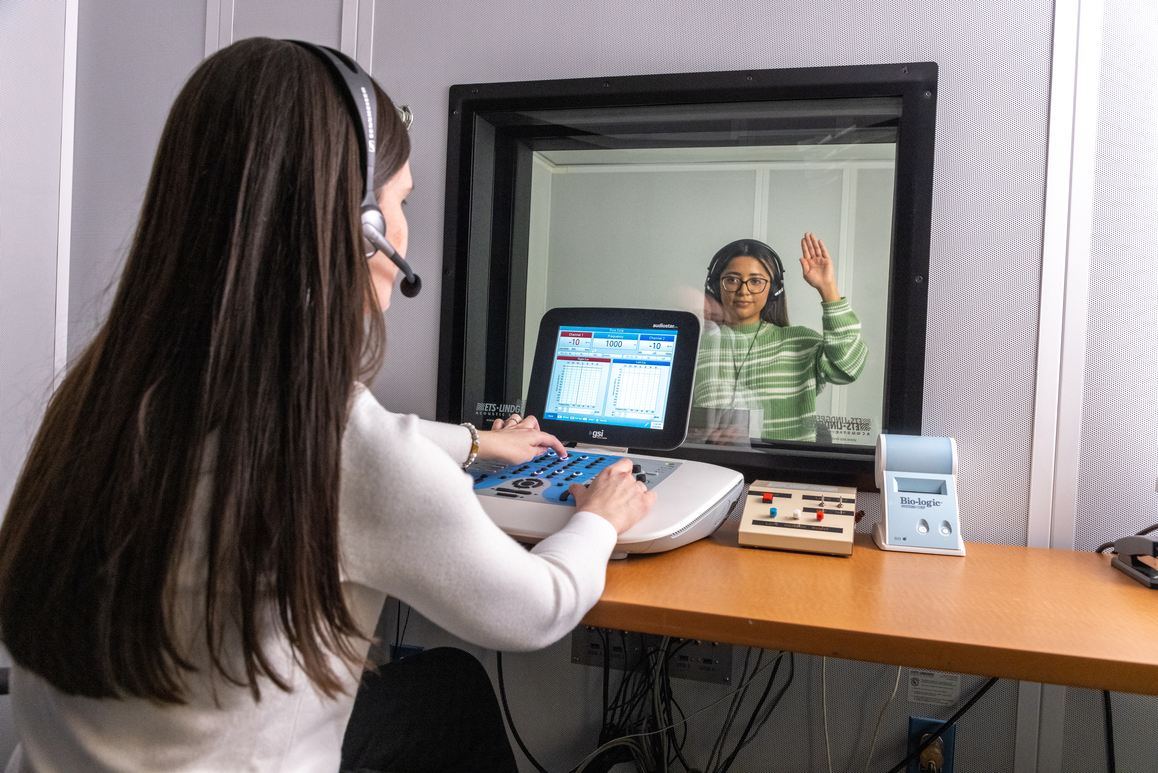 Communication disorders student working in a clinical setting