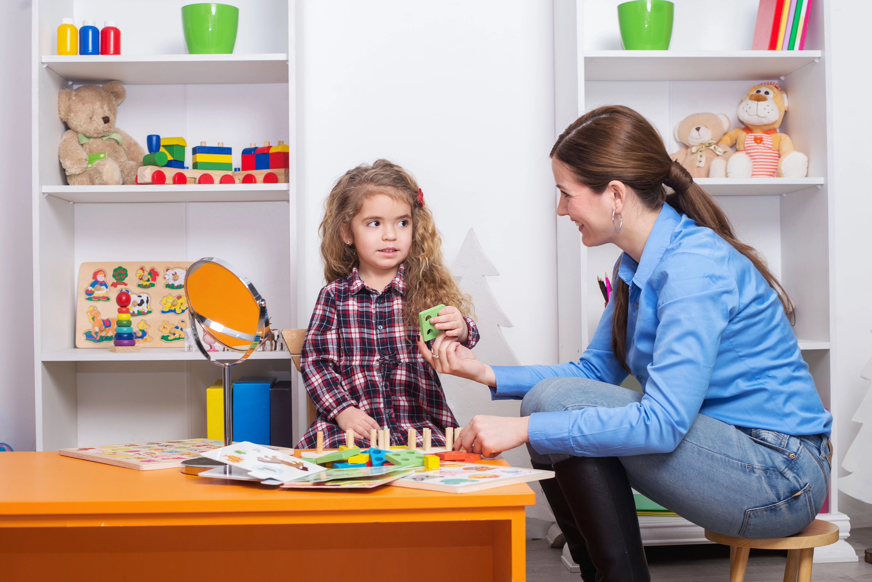 occupational therapist working with a child