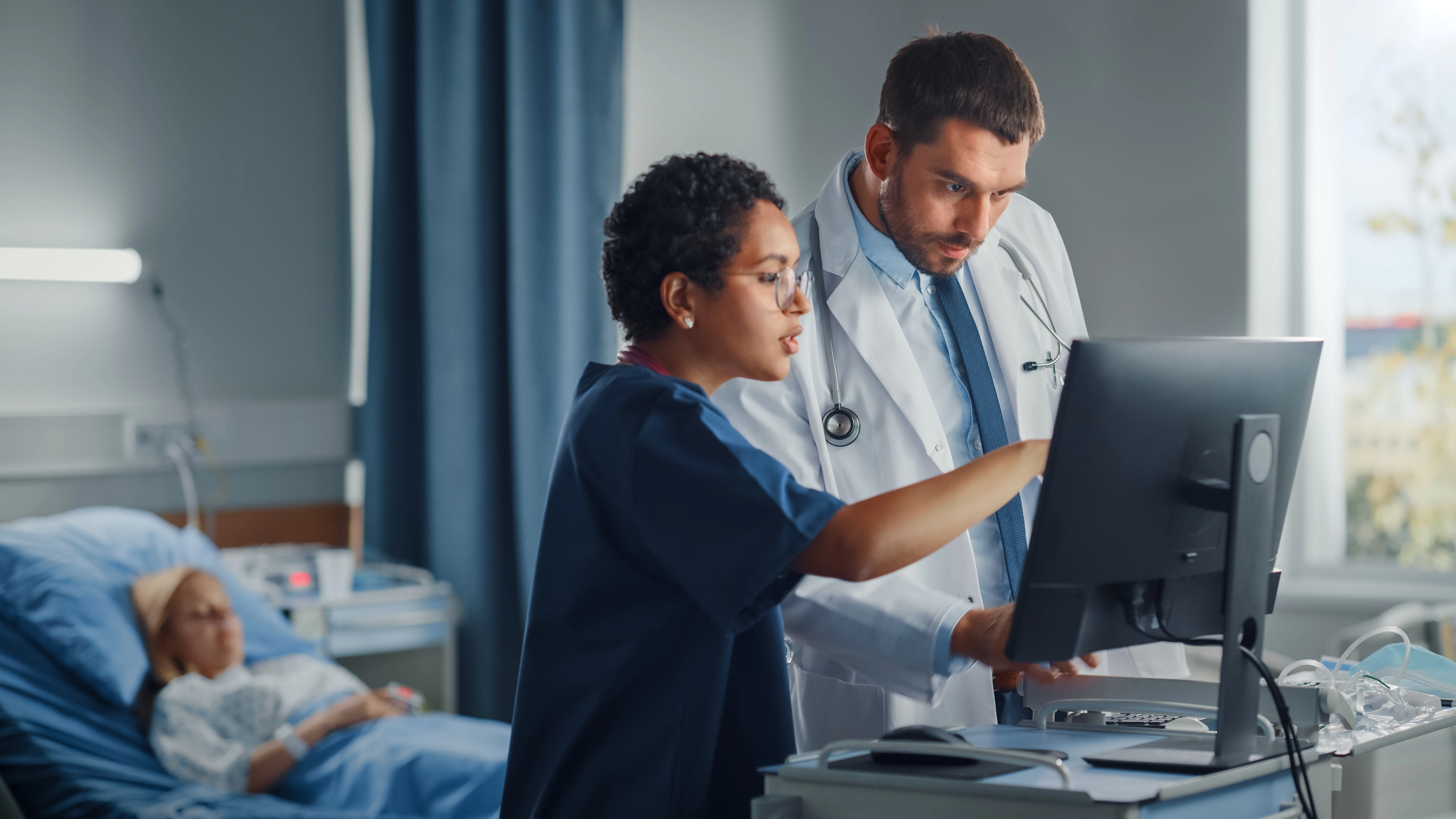 doctor and nurses talking
