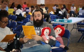 Student participating in poverty simulation