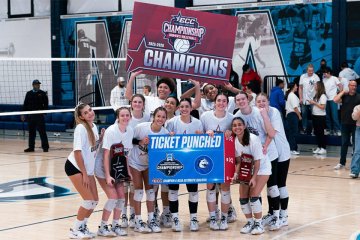 Mercy University Women's Volleyball Team celebrating heading to the NCAA Divisio9n II Championship tournament