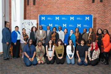 Group shot of participants and hosts of MedTech & Finance Conference held at Mercy University