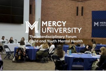 Attendees at Mercy University's Rotunda for the The Interdisciplinary Forum on Child and Youth Mental Health 