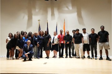 Mercy University High School Scholars and Influencers program participants and leadership pose at their completion ceremony in the Bronx Campus