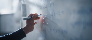 math equations on a chalk board