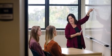 Students and a professor in a classroom