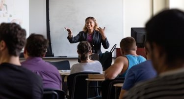 teacher engaged with students