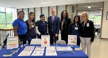 Mercy University School of Nursing students, faculty and staff along with White Plains Mayor Thomas M. Roach 