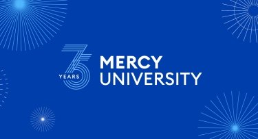 Mercy University  and 75th anniversary logo with fireworks in background