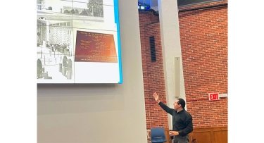 Eric Martone, dean of the School of Education presents history of Mercy University campuses