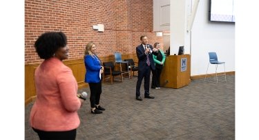 Mercy University and WCA staff address attendees at Workforce Development Committee meeting