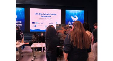 Students present at the USA Blue Schools Student Symposium