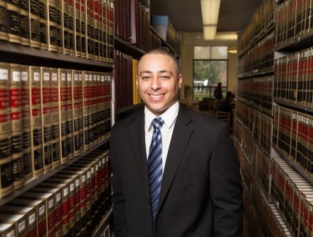 Criminal Justice student in the Law Section of the Mercy Library.