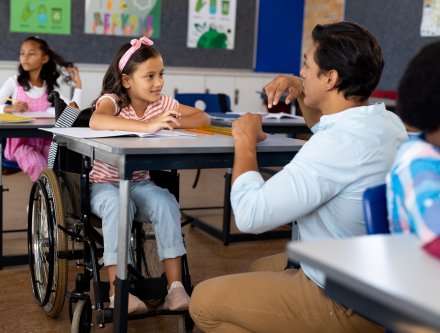 Teacher with student