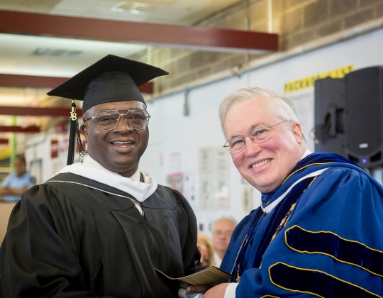 President Hall confers degrees for graduating class at Sing Sing Correctional Facility