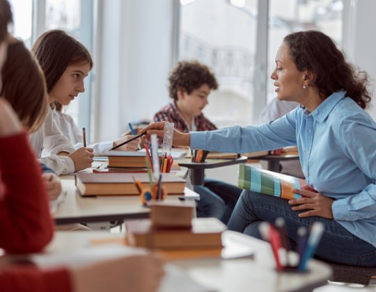 Teacher with students