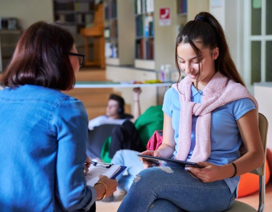 Counselor with student