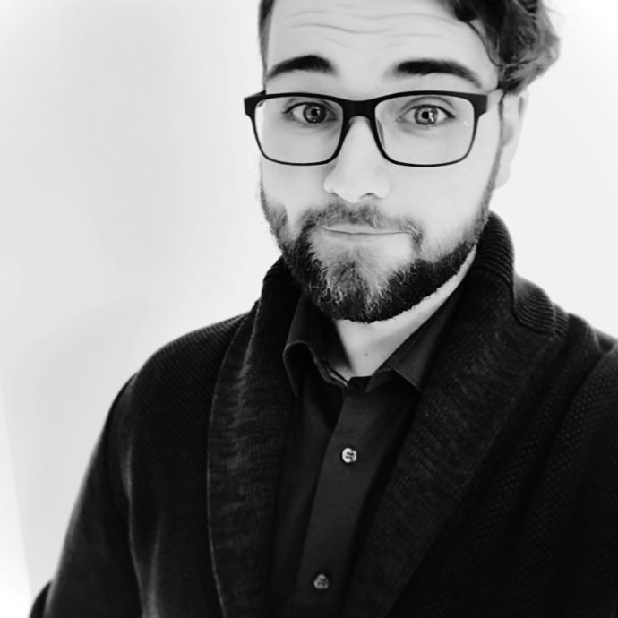 A headshot photograph of Professor Nathan T. Kline