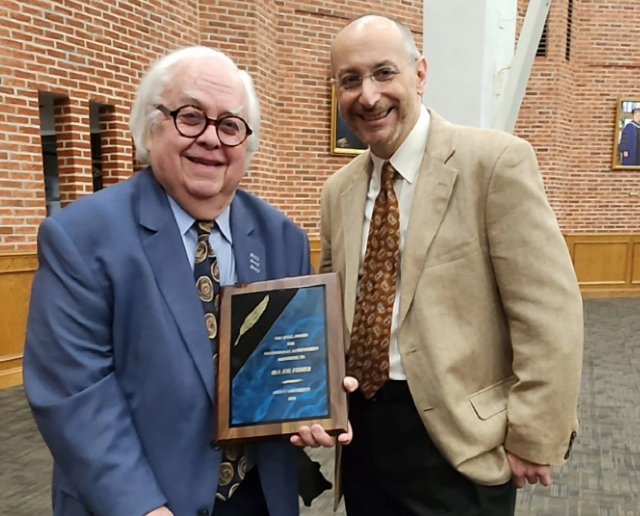 Professor Louis Grasso posed with Quill Awards honoree Ira Joe Fisher