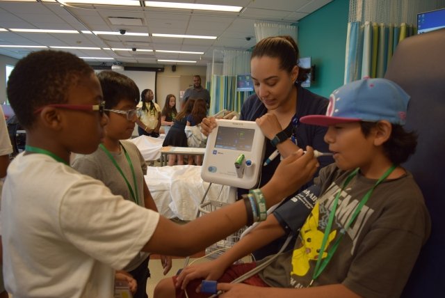 Verizon STEM Achievers Summer program participants learn how the nursing simulation lab is used