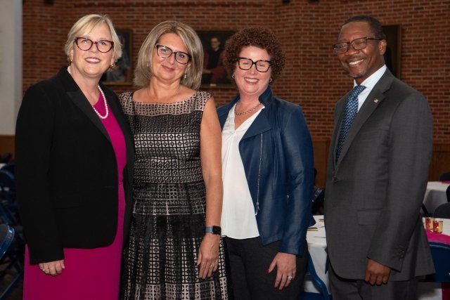 Mercy University President Susan L. Parish with staff