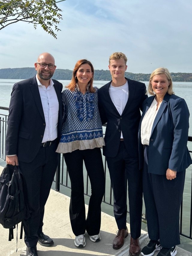 Mercy University international student with Danish minister and Danish delegation