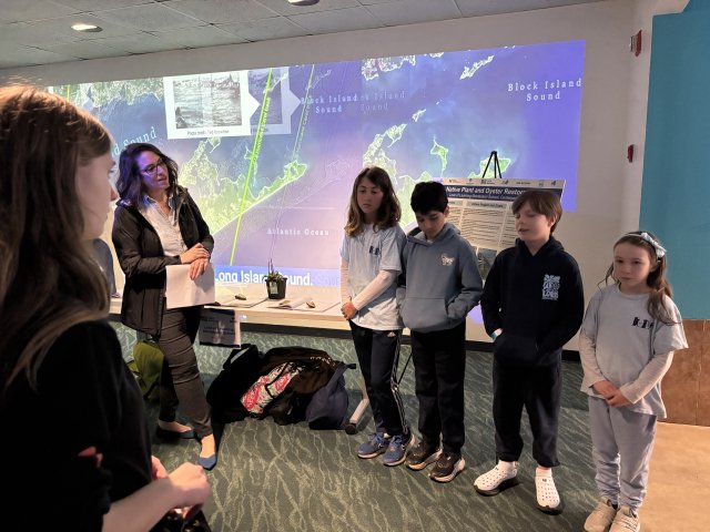 Students from Love of Learning Montessori School at USA Blue Schools Student Symposium